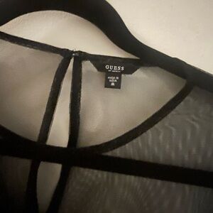 Sheet black top with appliqués